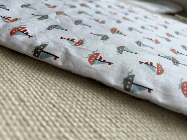 Coussin ovale "petits bateaux" 