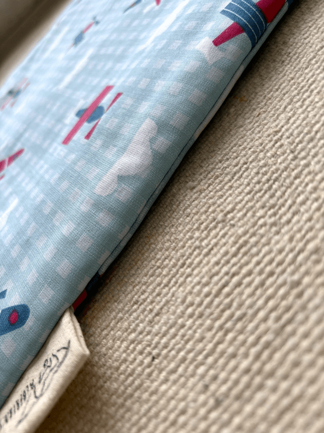 Coussin ovale "avions"